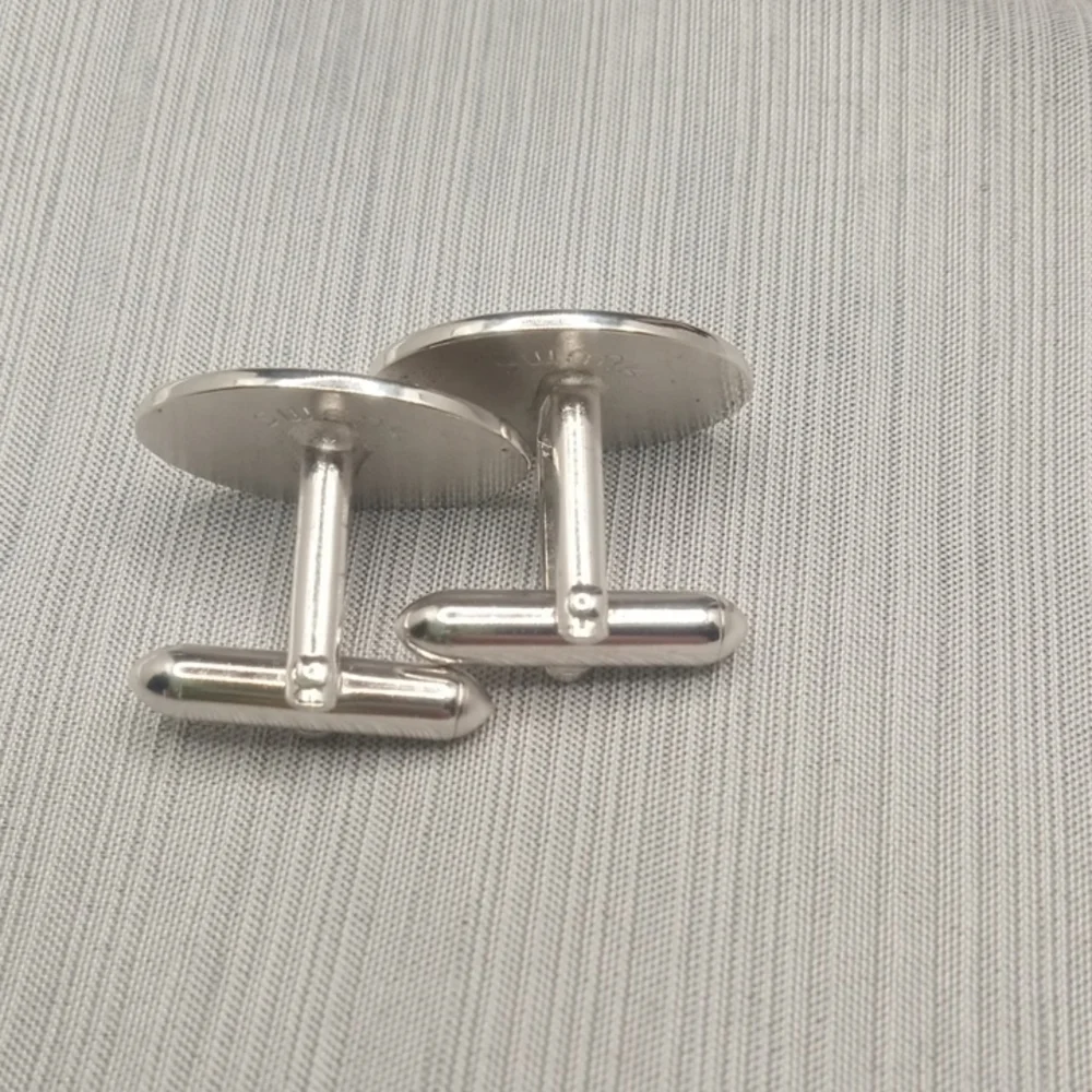 Silver Toned Oval Cufflinks By Swank
